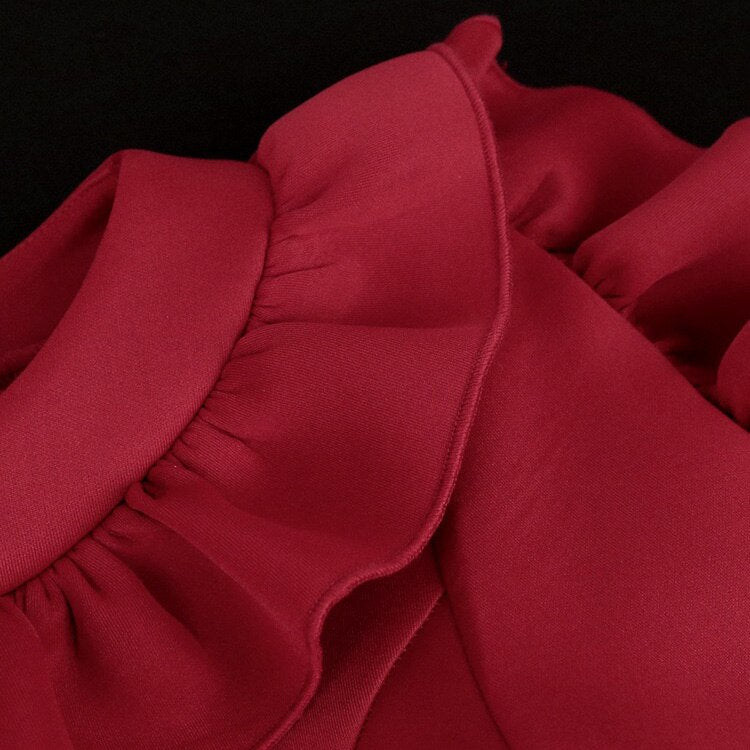 Nandi Long Sleeve O Neck Ruffles Peplum